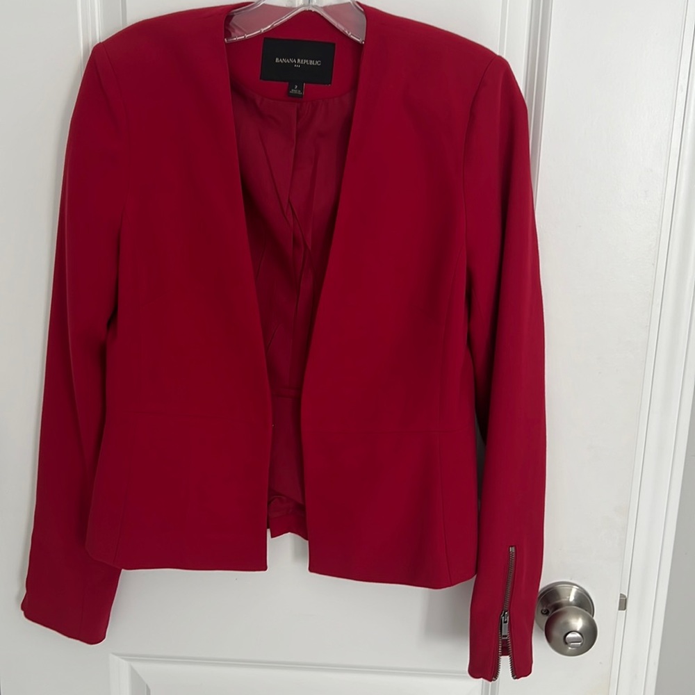 Red blazer/jacket. Never worn! Perfect condition!